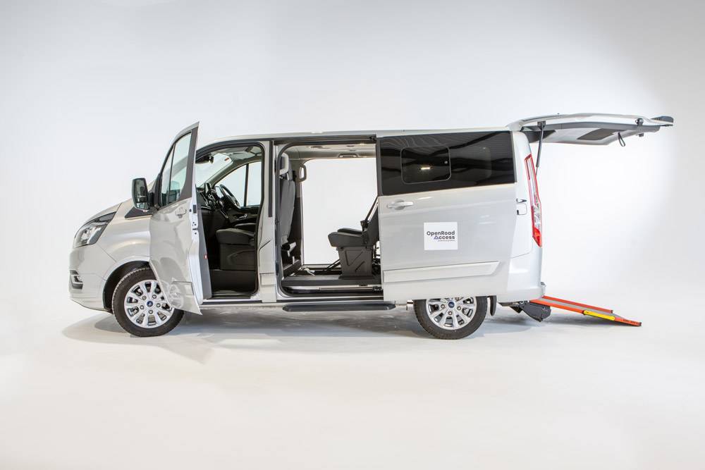 Wheelchair Adapted Vehicle with Open Road Access Logo on the side